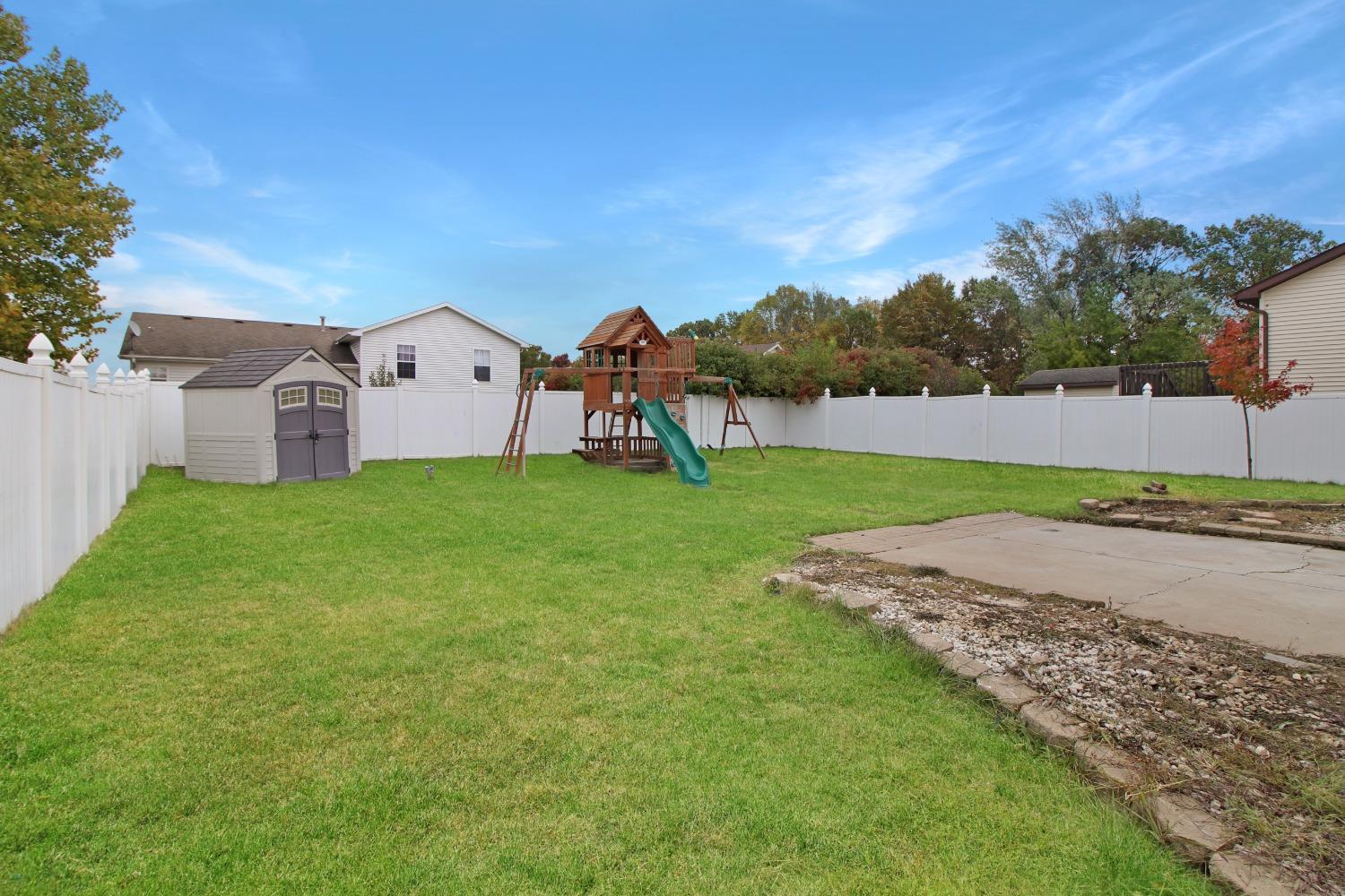 12465 Shelby Place Crown Point, IN 46307 - Photo 8 of 25 a view of a house with a yard