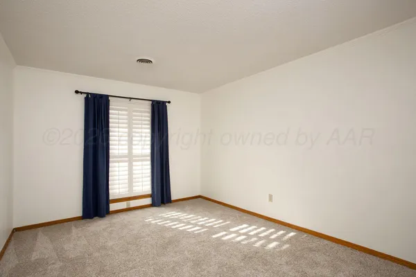 an empty room with closet