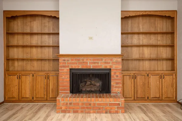 a living room with a fireplace