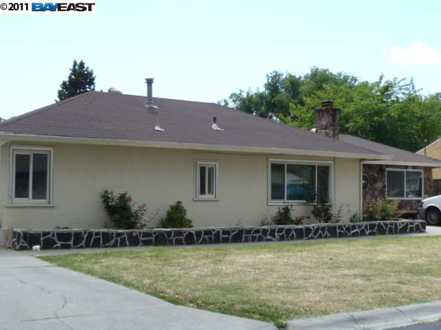 1521 Waltham Road Concord, CA 94520 - Photo 1 of 1 a front view of a house with garden