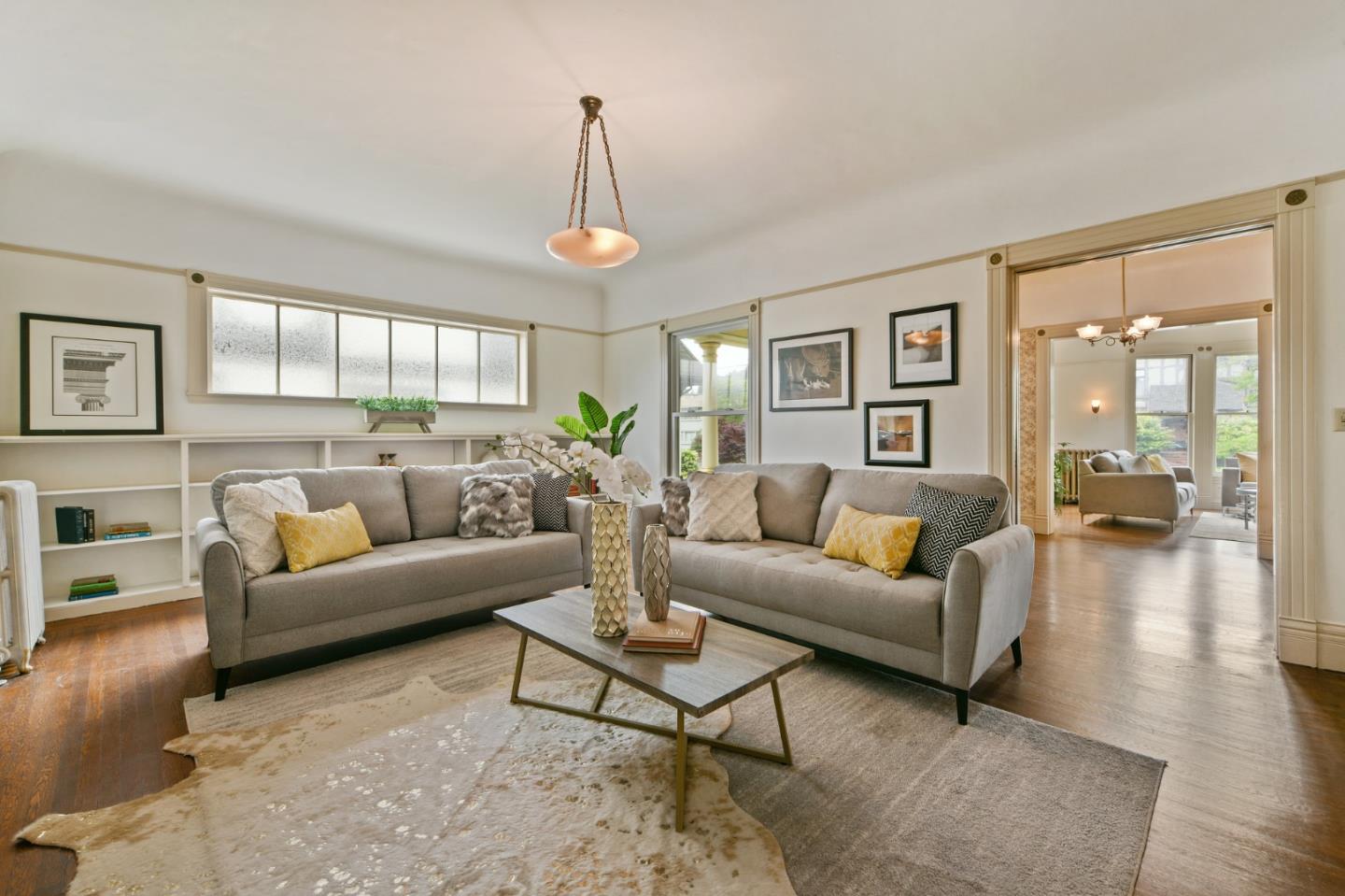 1106 Grand Street Alameda, CA 94501 - Photo 19 of 100 a living room with furniture and a large window