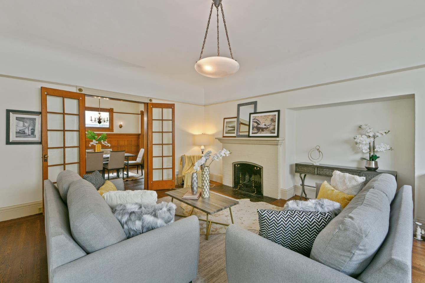 1106 Grand Street Alameda, CA 94501 - Photo 20 of 100 a living room with furniture and a fireplace