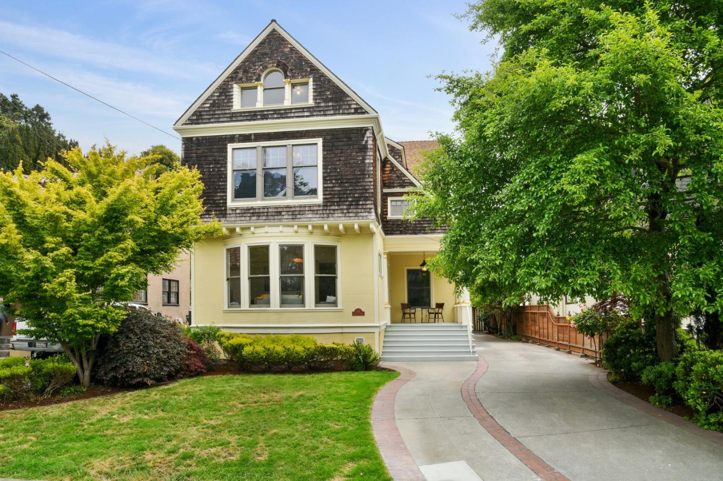 1106 Grand Street Alameda, CA 94501 - Photo 2 of 100 a front view of a house with a yard