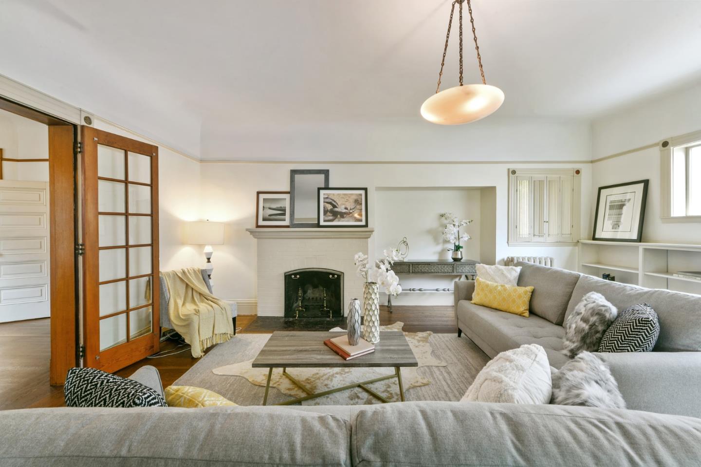 1106 Grand Street Alameda, CA 94501 - Photo 23 of 100 a living room with furniture or couch and a fireplace