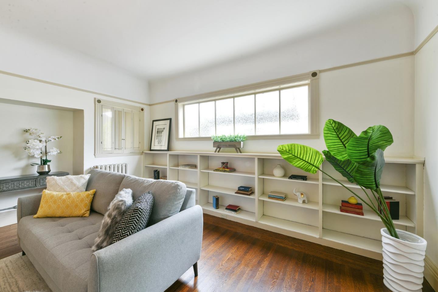 1106 Grand Street Alameda, CA 94501 - Photo 24 of 100 a living room with furniture and a large window