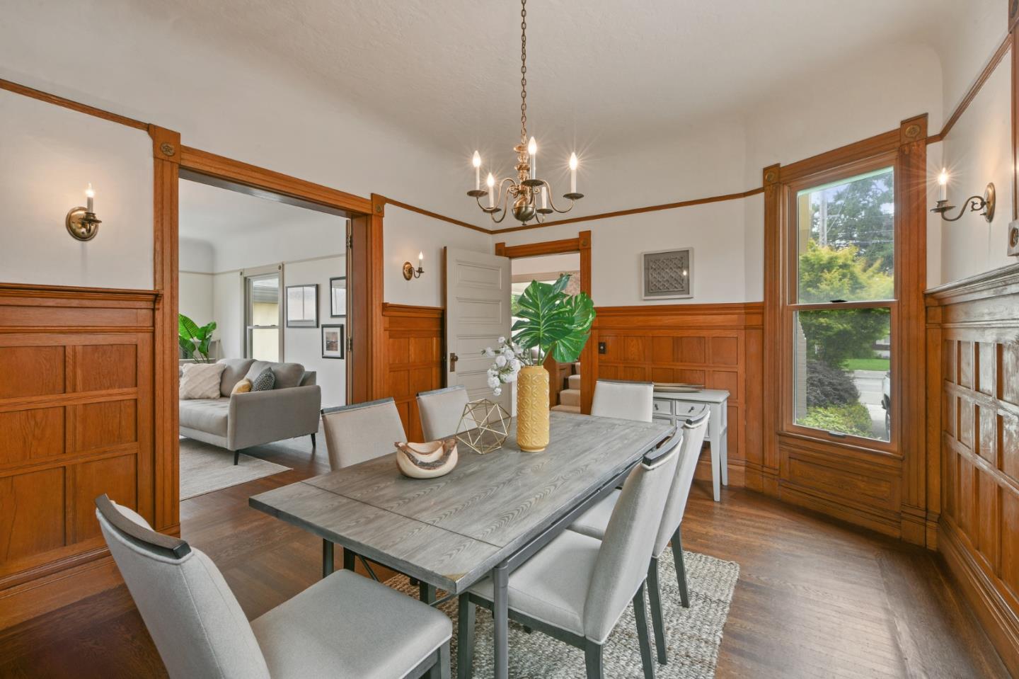1106 Grand Street Alameda, CA 94501 - Photo 28 of 100 a dining room with furniture a window and wooden floor