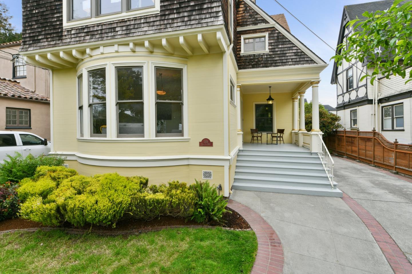 1106 Grand Street Alameda, CA 94501 - Photo 3 of 100 a front view of a house with a garden