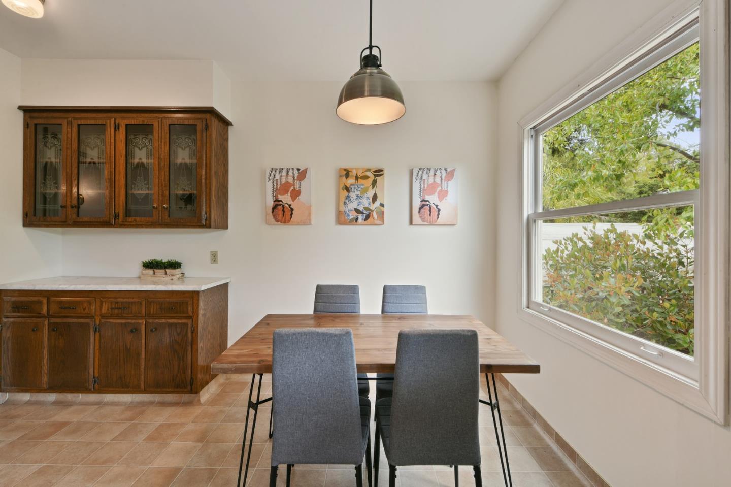 1106 Grand Street Alameda, CA 94501 - Photo 38 of 100 a view of a dining room with furniture window and outside view