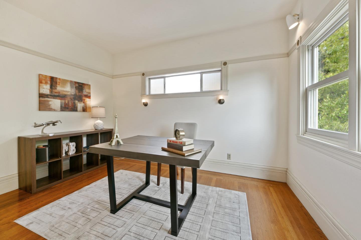 1106 Grand Street Alameda, CA 94501 - Photo 67 of 100 a view of a workspace with furniture and a window