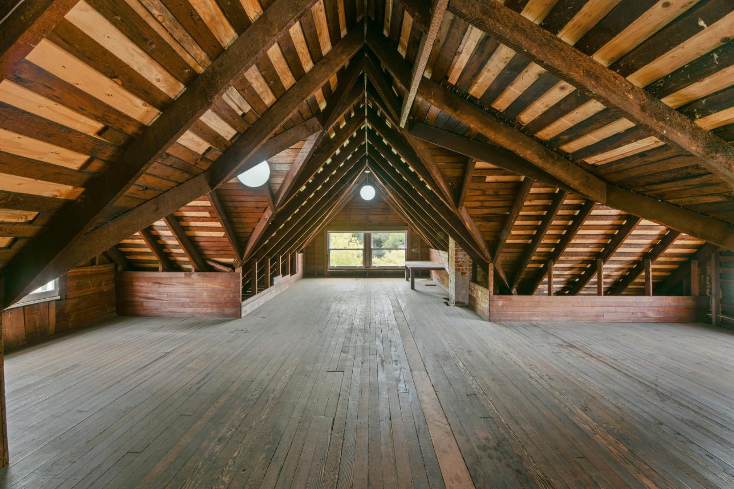 1106 Grand Street Alameda, CA 94501 - Photo 69 of 100 a view of an empty room with wooden floor staircase and a kitchen
