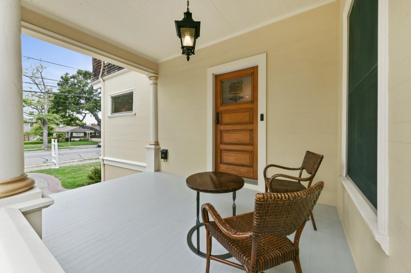 1106 Grand Street Alameda, CA 94501 - Photo 7 of 100 a view of a patio with table and chairs with wooden floor and plants