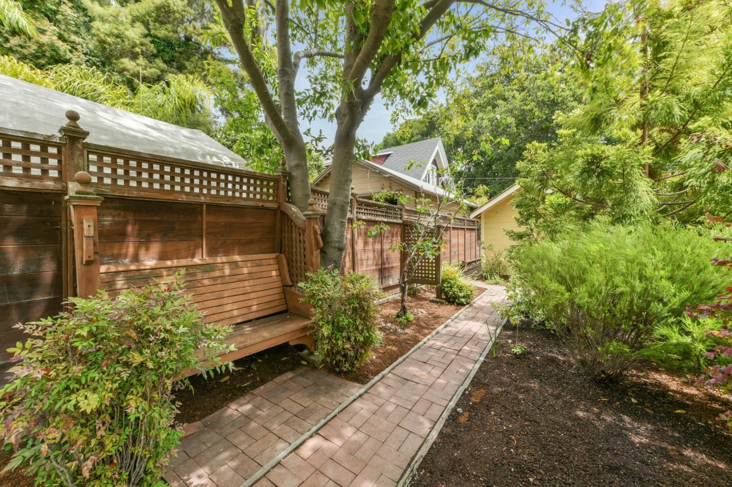 1106 Grand Street Alameda, CA 94501 - Photo 86 of 100 a front view of a house with a yard