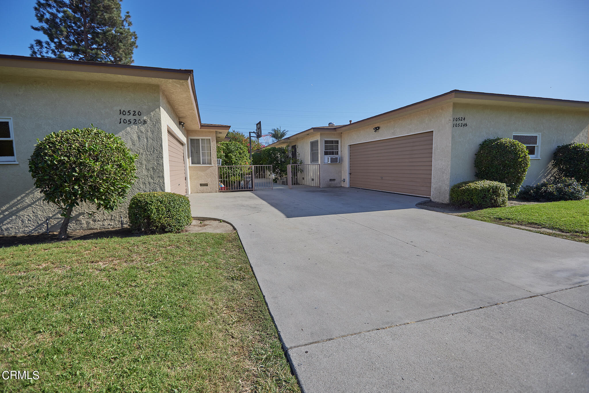 10520 Myrtle Street Downey, CA 90241 - Photo 2 of 8 a view of a house with a yard