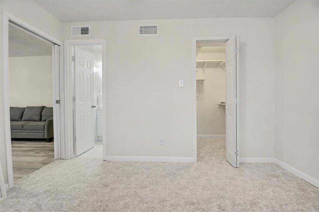 9815 Walnut Street, Unit H306 Dallas, TX 75243 - Photo 11 of 23 a view of livingroom with furniture and window