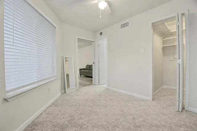 a view of empty room with a window