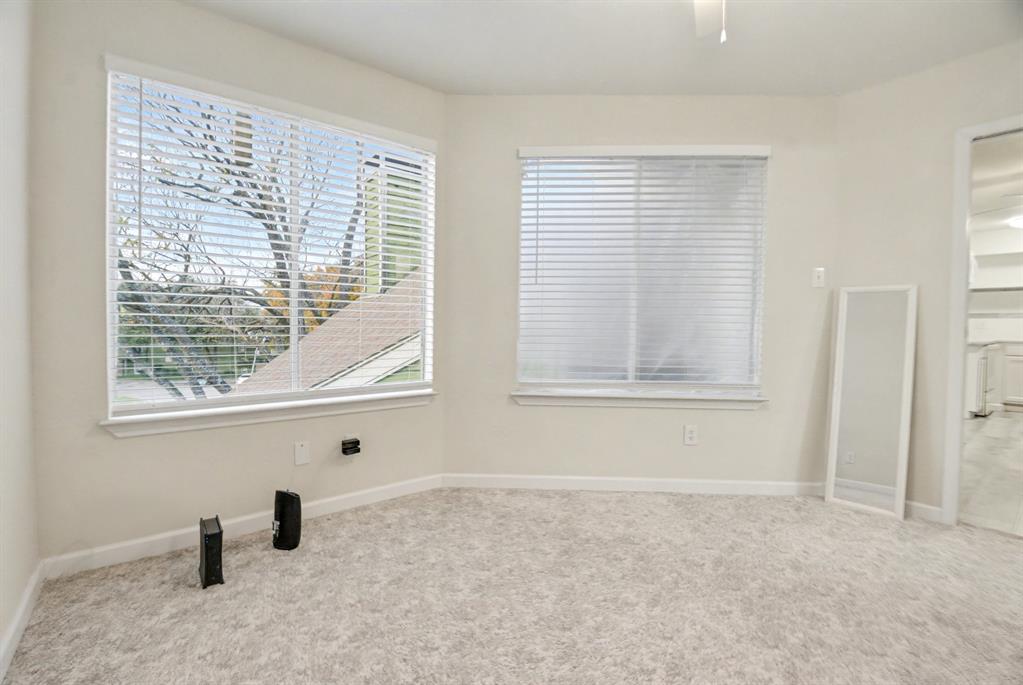 9815 Walnut Street, Unit H306 Dallas, TX 75243 - Photo 13 of 23 a view of empty room with a window