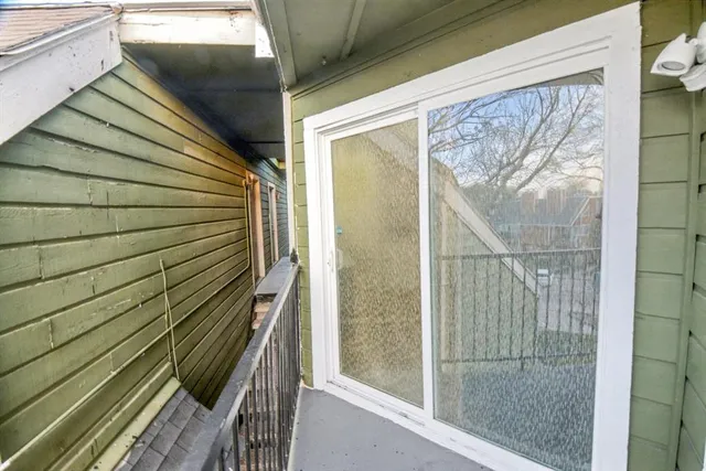 a swimming pool with outdoor seating and yard