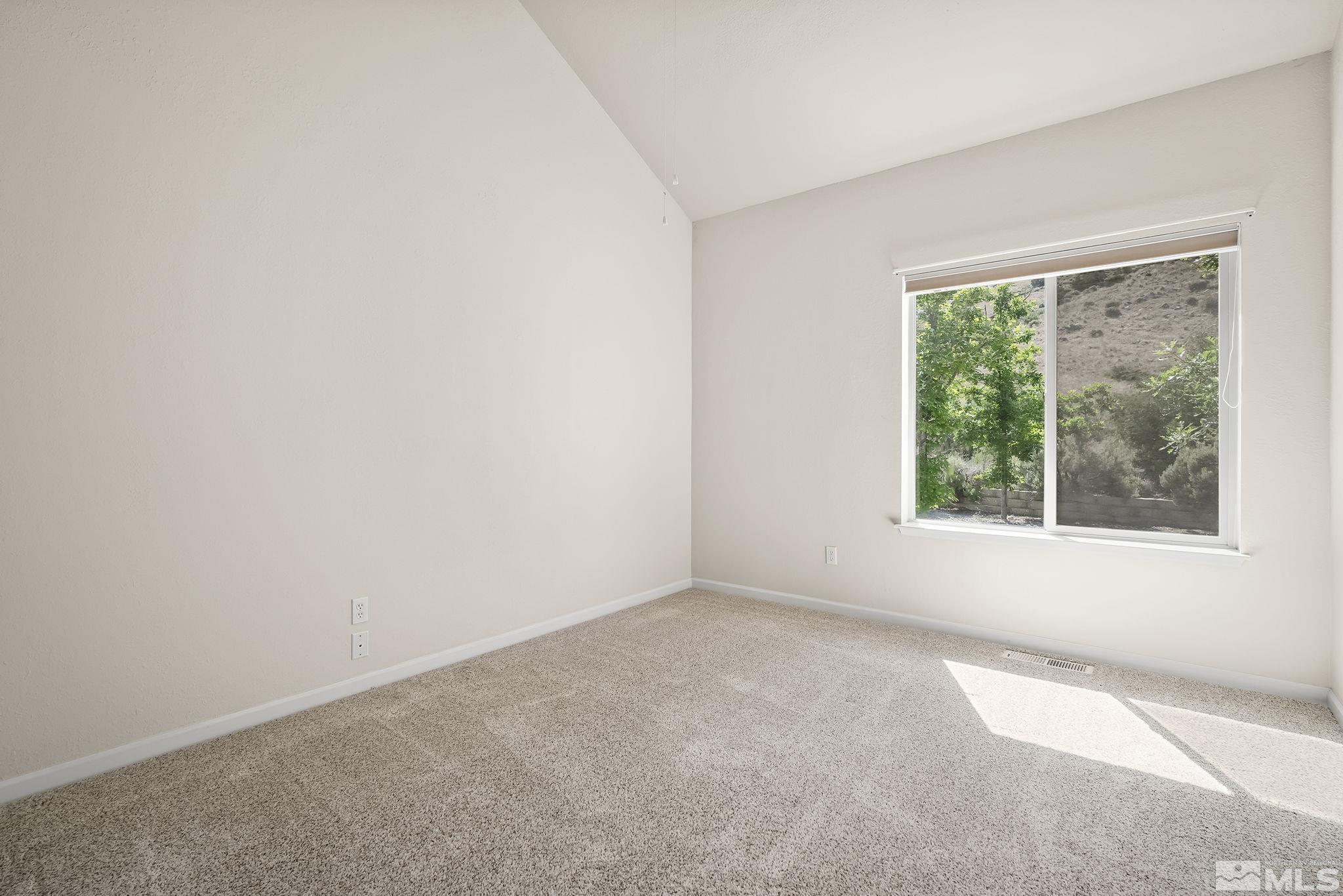 1352 Antelope Valley Road Reno, NV 89506 - Photo 15 of 36 an empty room with a window