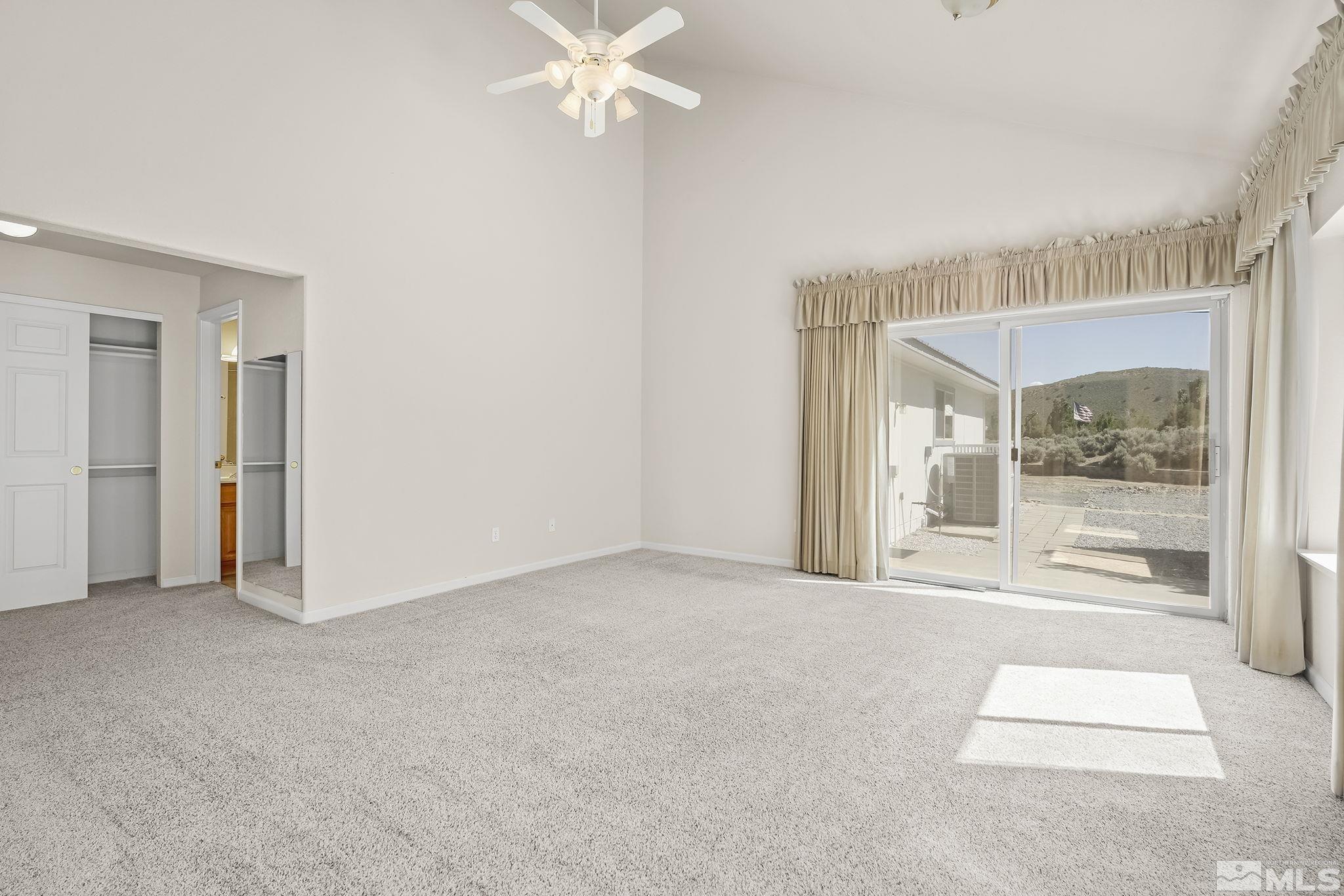 1352 Antelope Valley Road Reno, NV 89506 - Photo 17 of 36 a view of an empty room with a window