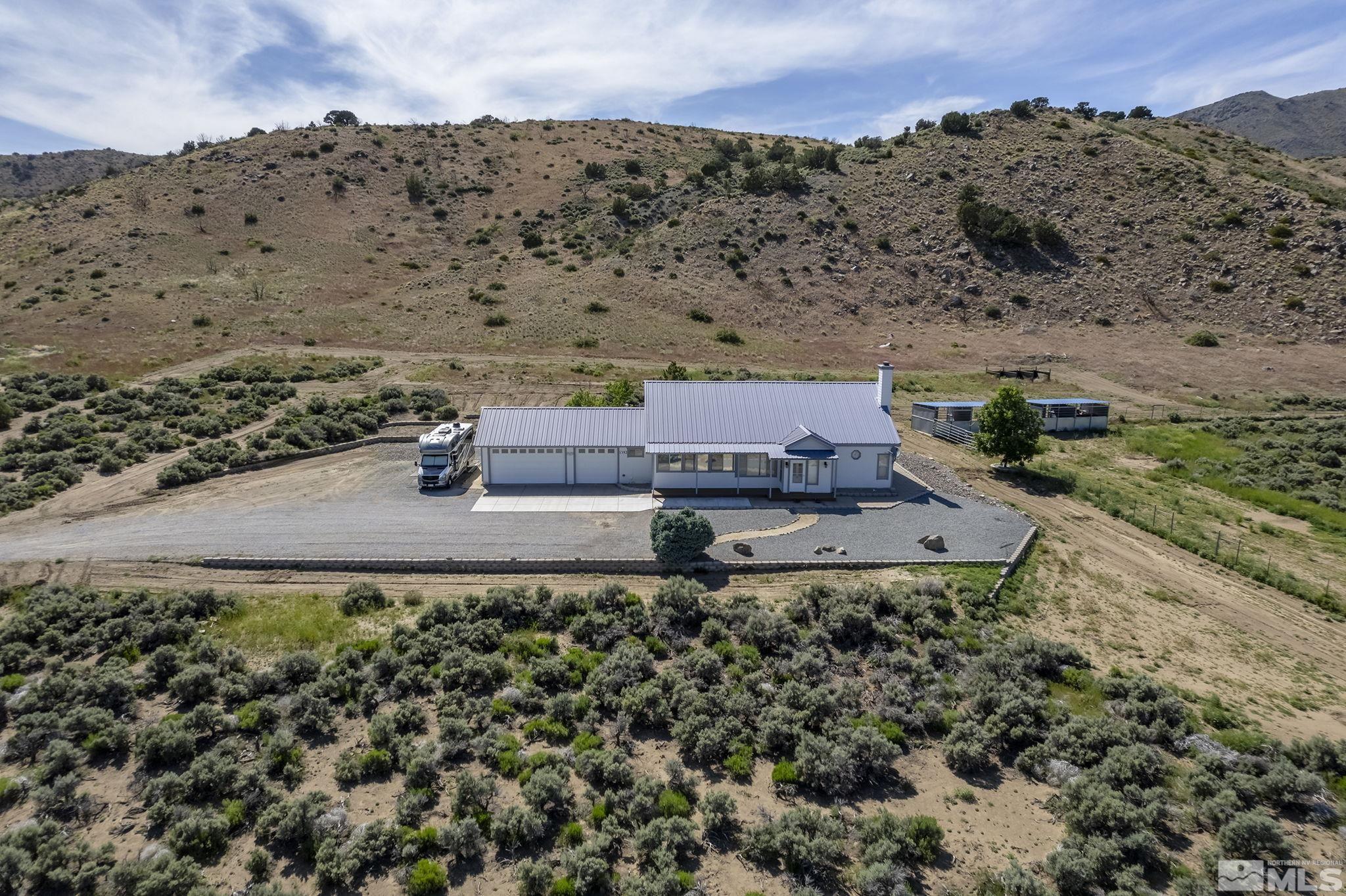 1352 Antelope Valley Road Reno, NV 89506 - Photo 24 of 36 an aerial view of a house with a garden