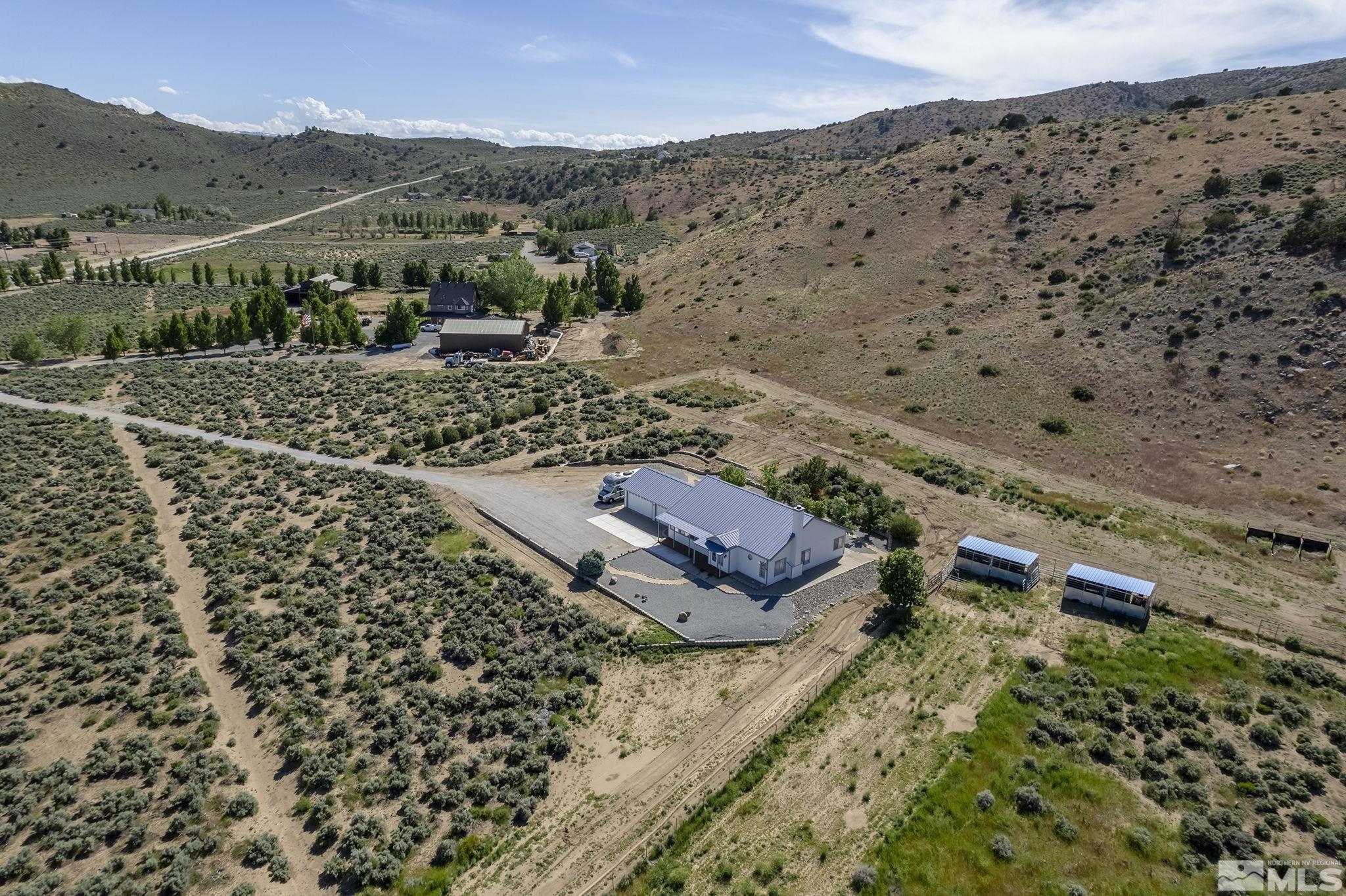 1352 Antelope Valley Road Reno, NV 89506 - Photo 25 of 36 a view of a mountain with a field