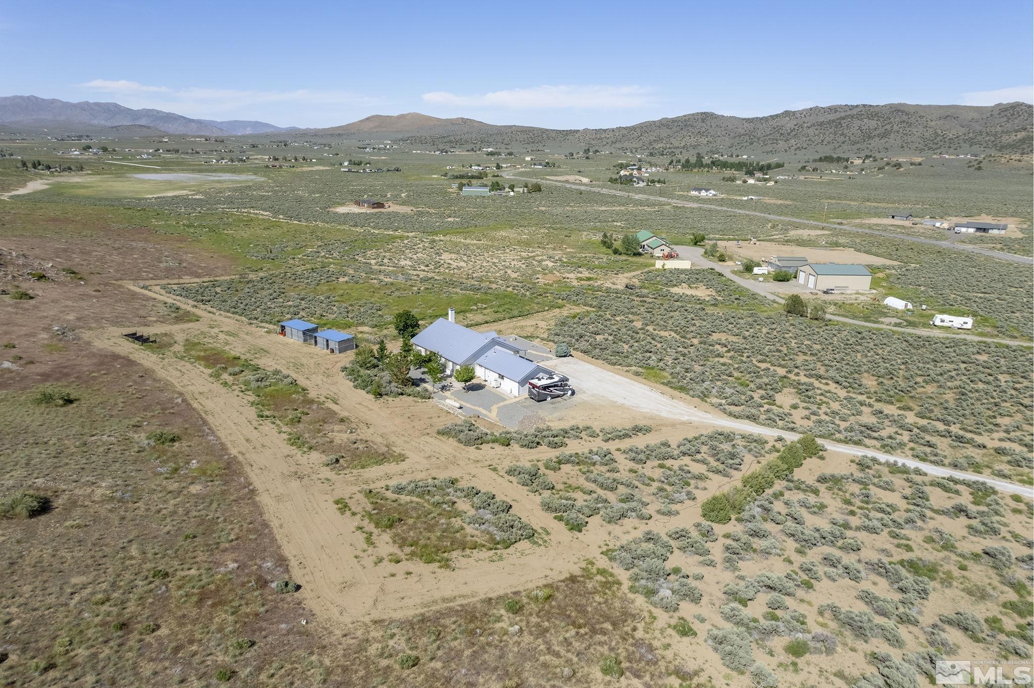 1352 Antelope Valley Road Reno, NV 89506 - Photo 28 of 36 a view of a lake with a mountain