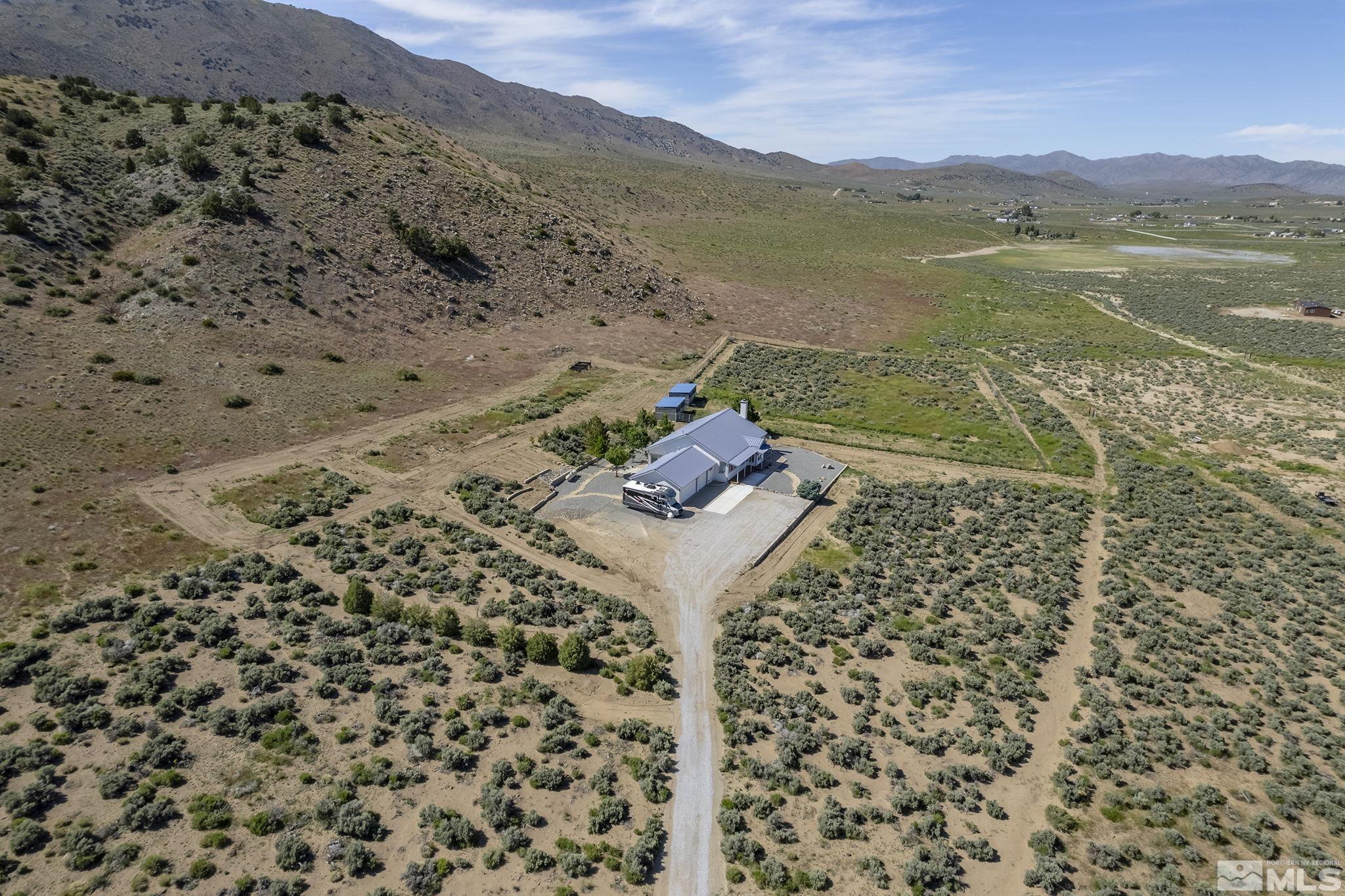 1352 Antelope Valley Road Reno, NV 89506 - Photo 29 of 36 a view of a backyard with water view and mountain view