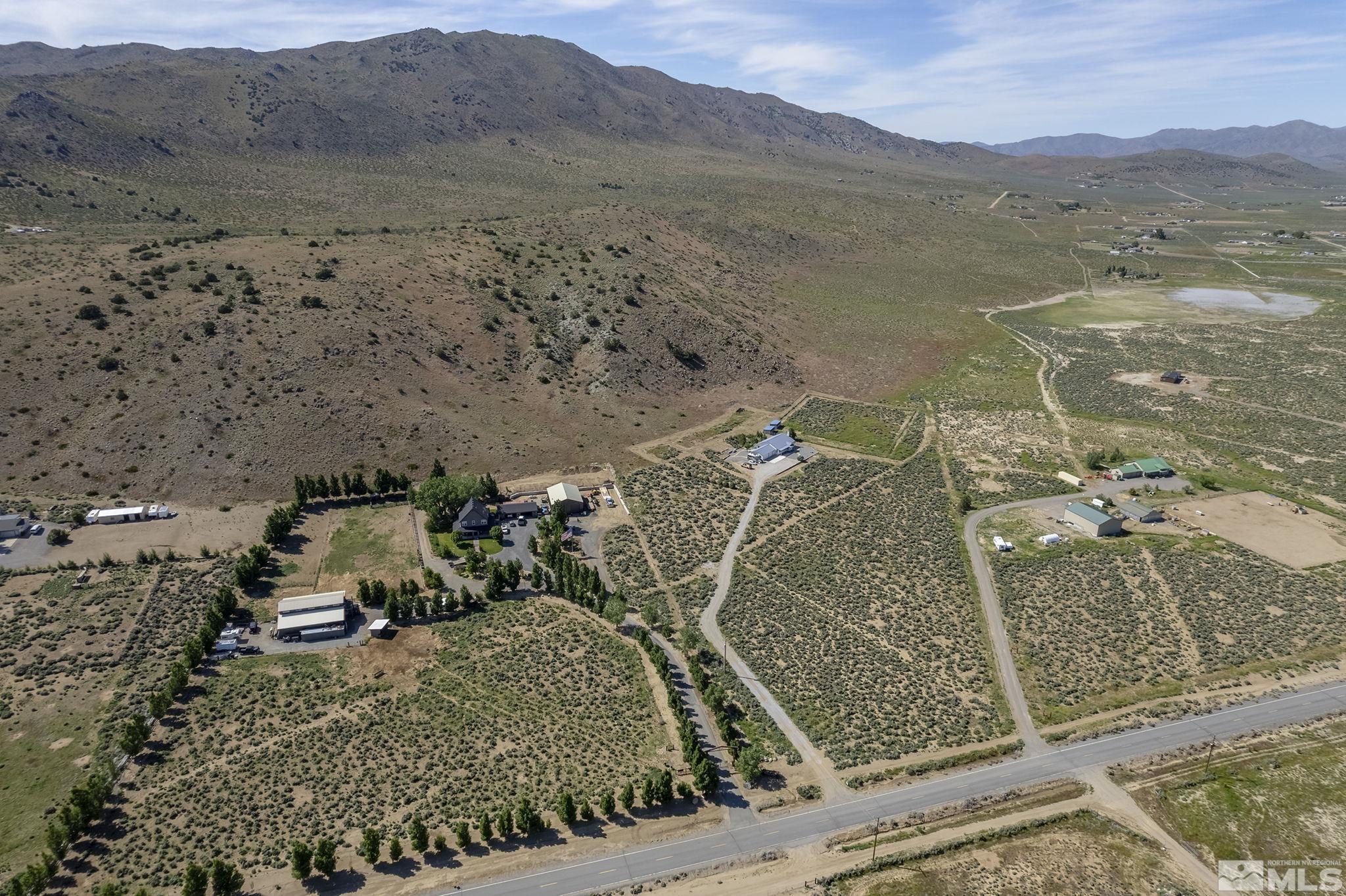 1352 Antelope Valley Road Reno, NV 89506 - Photo 33 of 36 an aerial view of a house with a mountain