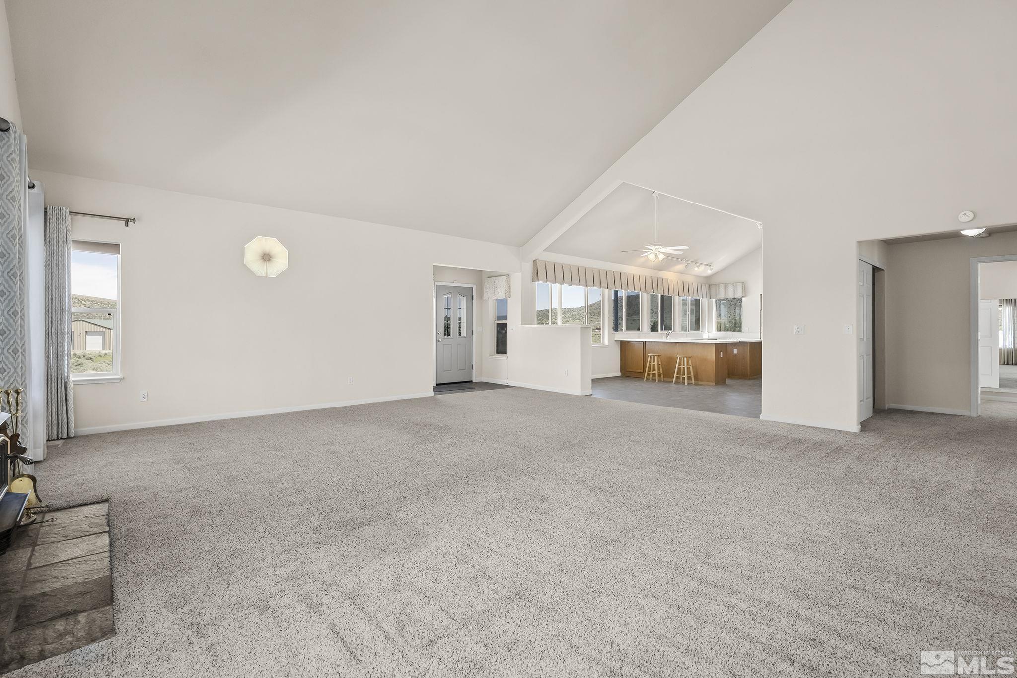 1352 Antelope Valley Road Reno, NV 89506 - Photo 6 of 36 a view of empty room with a furniture and fireplace