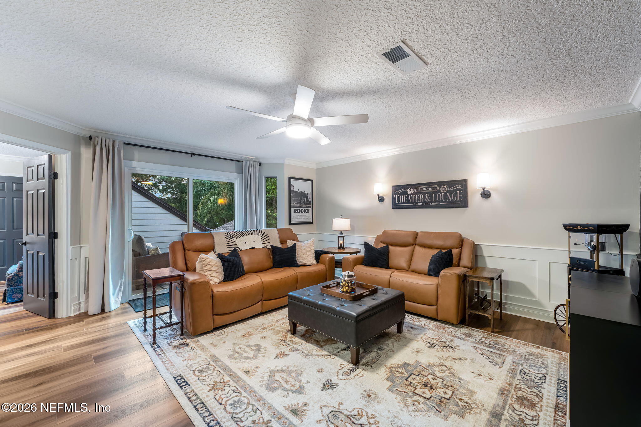 1204 Creek Bend Road St. Johns, FL 32259 - Photo 60 of 107 a living room with furniture and a large window