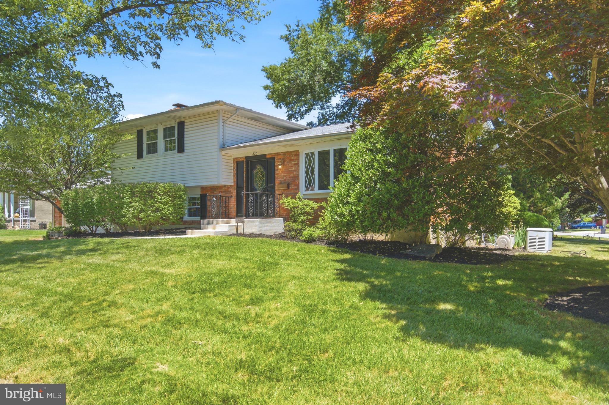 220 Solway Road Lutherville-Timonium, MD 21093 - Photo 2 of 38 a view of a house with yard and a garden