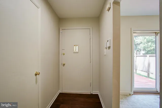 a kitchen with stainless steel appliances granite countertop a refrigerator a sink a stove and island