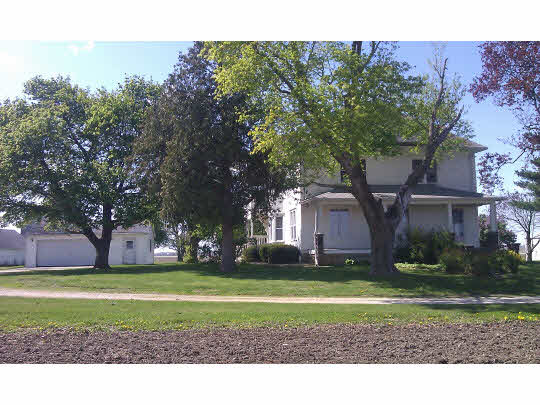 2029 Carline Road Ashton, IL 61006 - Photo 1 of 11 a front view of a house with a yard