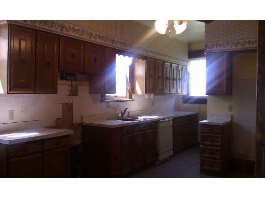 2029 Carline Road Ashton, IL 61006 - Photo 4 of 11 a kitchen with a sink cabinets and window