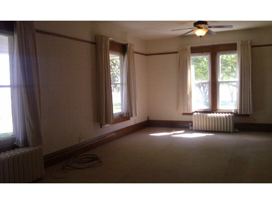 2029 Carline Road Ashton, IL 61006 - Photo 6 of 11 a black and white photo of a living room