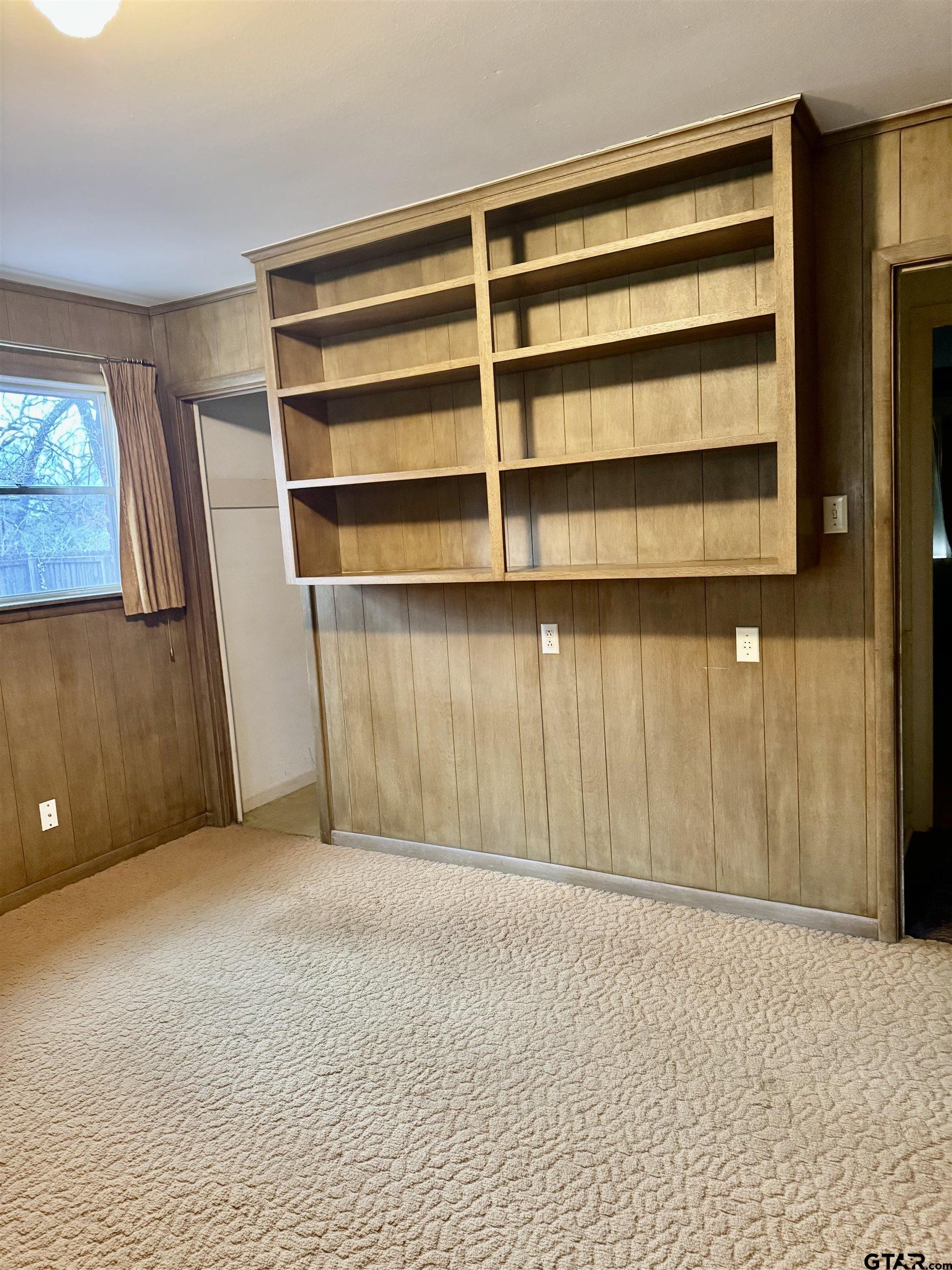 1113 East Amherst Drive Tyler, TX 75701 - Photo 6 of 7 a view of an empty room with a window
