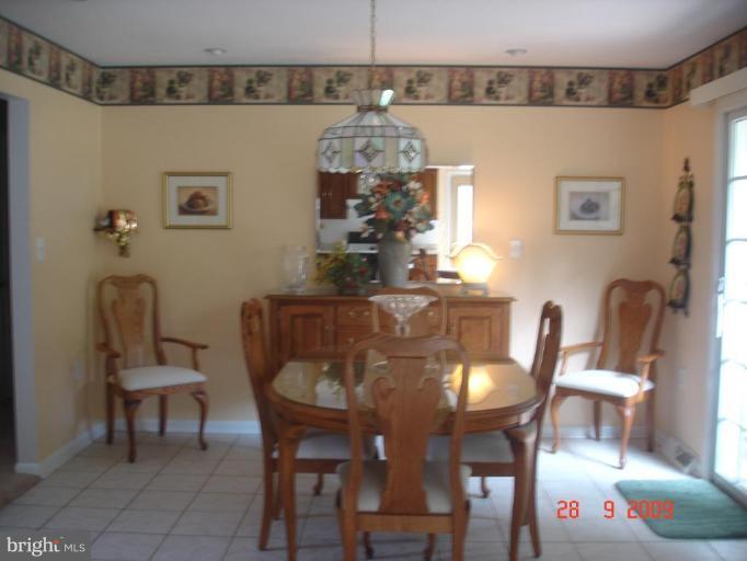 3805 Houcks Road Monkton, MD 21111 - Photo 2 of 29 a view of a dining room with furniture and wooden floor