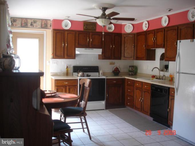 3805 Houcks Road Monkton, MD 21111 - Photo 15 of 29 a kitchen with a sink cabinets and window