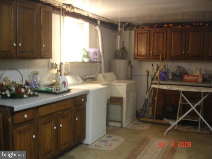 3805 Houcks Road Monkton, MD 21111 - Photo 16 of 29 a kitchen with a sink cabinets and window