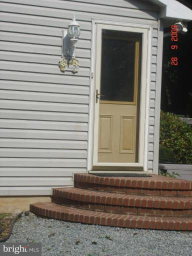 3805 Houcks Road Monkton, MD 21111 - Photo 22 of 29 a view of a house with a door and a door