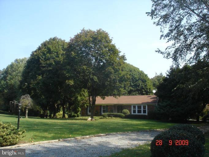 3805 Houcks Road Monkton, MD 21111 - Photo 27 of 29 a front view of a house with a yard