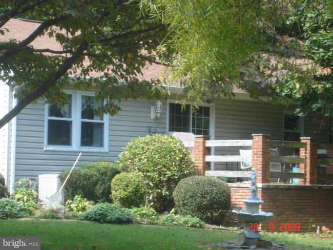 3805 Houcks Road Monkton, MD 21111 - Photo 4 of 29 a house with a tree in front of it
