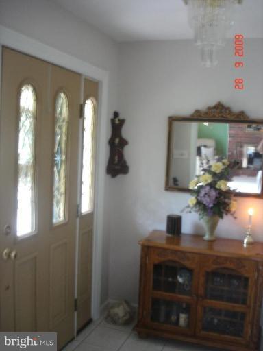 3805 Houcks Road Monkton, MD 21111 - Photo 7 of 29 a view of entryway and hall with wooden floor
