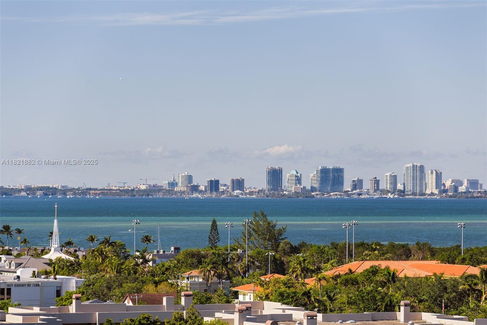 201 Crandon Boulevard, Unit 439 Key Biscayne, FL 33149 - Photo 19 of 24 a view of a city and a lake