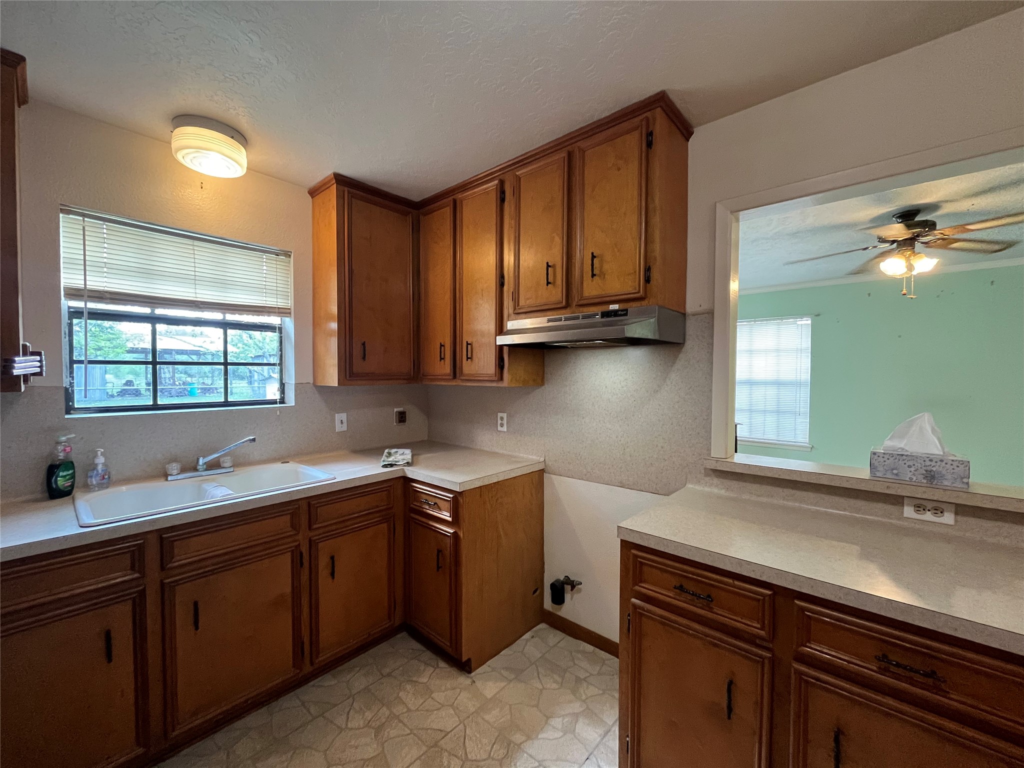 1475 Cr 16 Road Garwood, TX 77442 - Photo 17 of 43 a kitchen with a sink and cabinets