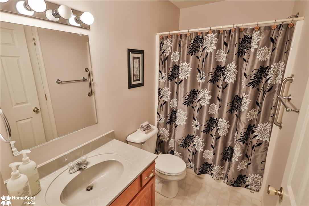 507 Howertown Road Northampton, PA 18067 - Photo 27 of 46 A well-appointed bathroom features a single vanity, modern fixtures, and practical tile flooring.