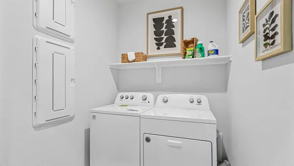 a kitchen with stainless steel appliances granite countertop a sink and a window