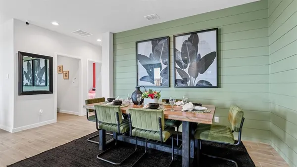 a kitchen with stainless steel appliances kitchen island granite countertop a sink and cabinets