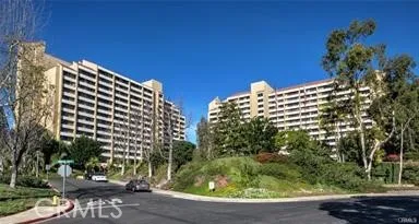 a view of building with yard