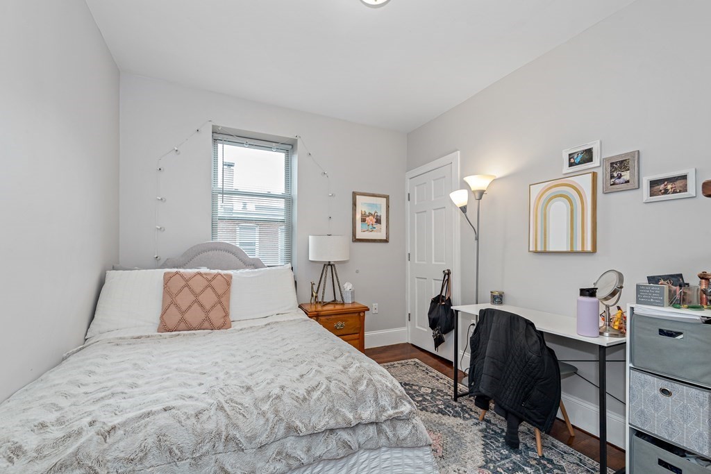 16 Sewall Street Boston, MA 02120 - Photo 12 of 42 a bedroom with bed chair and window